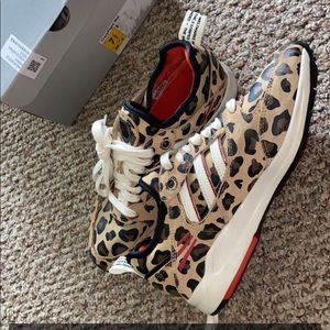 I wore them once! Adidas NEW shoes. Cheetah print!